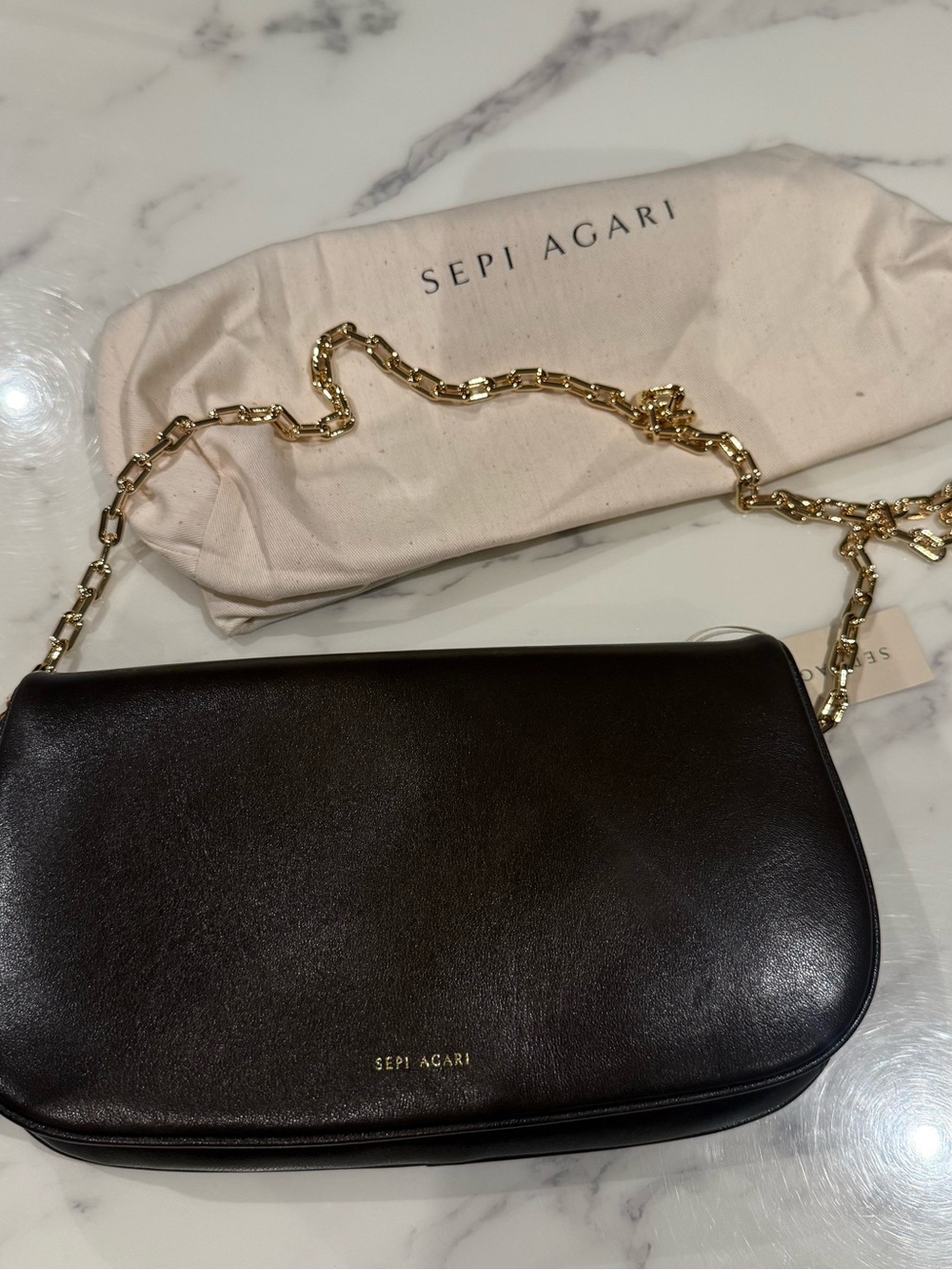 SEPI AGARI “ALLEGRIA” PURSE IN BROWN
GOAT SKIN with GOLD HARDWARE